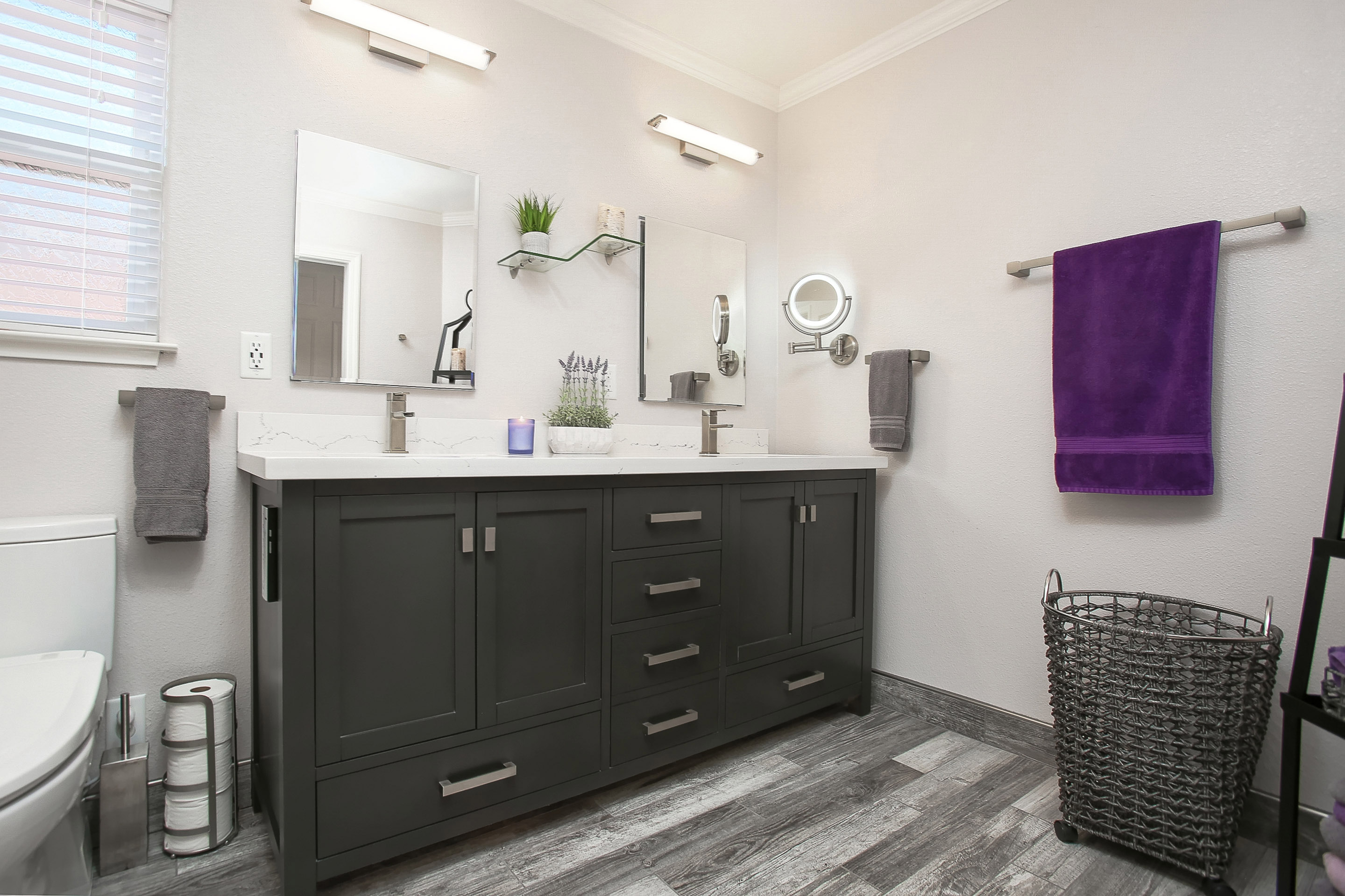 A previously crammed half bath transformed into a spacious place for pampering.
