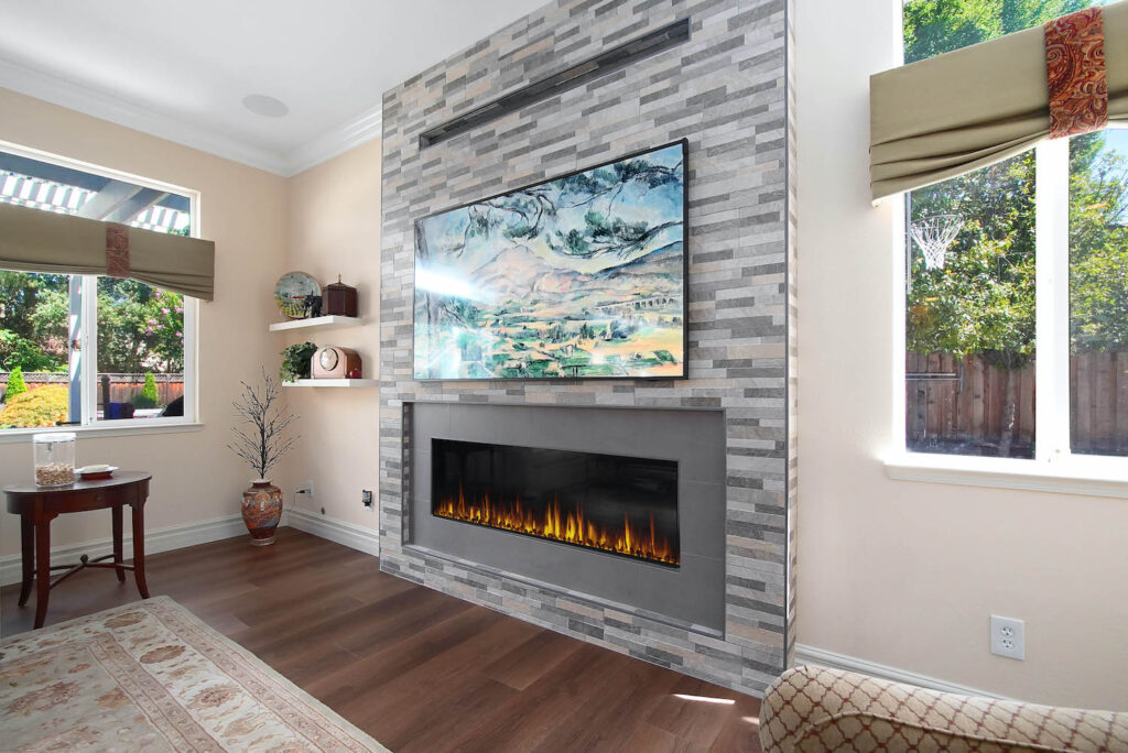 tile fireplace with painting above