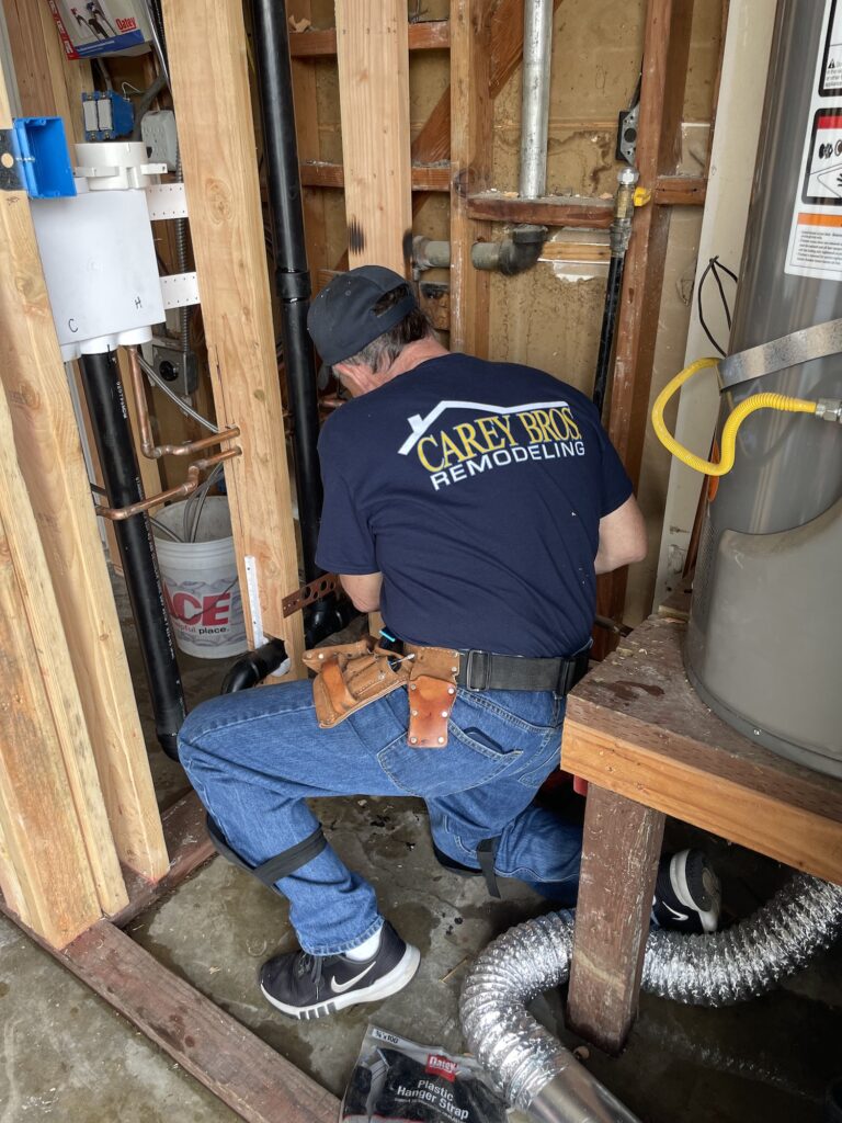 Contractor working on piping