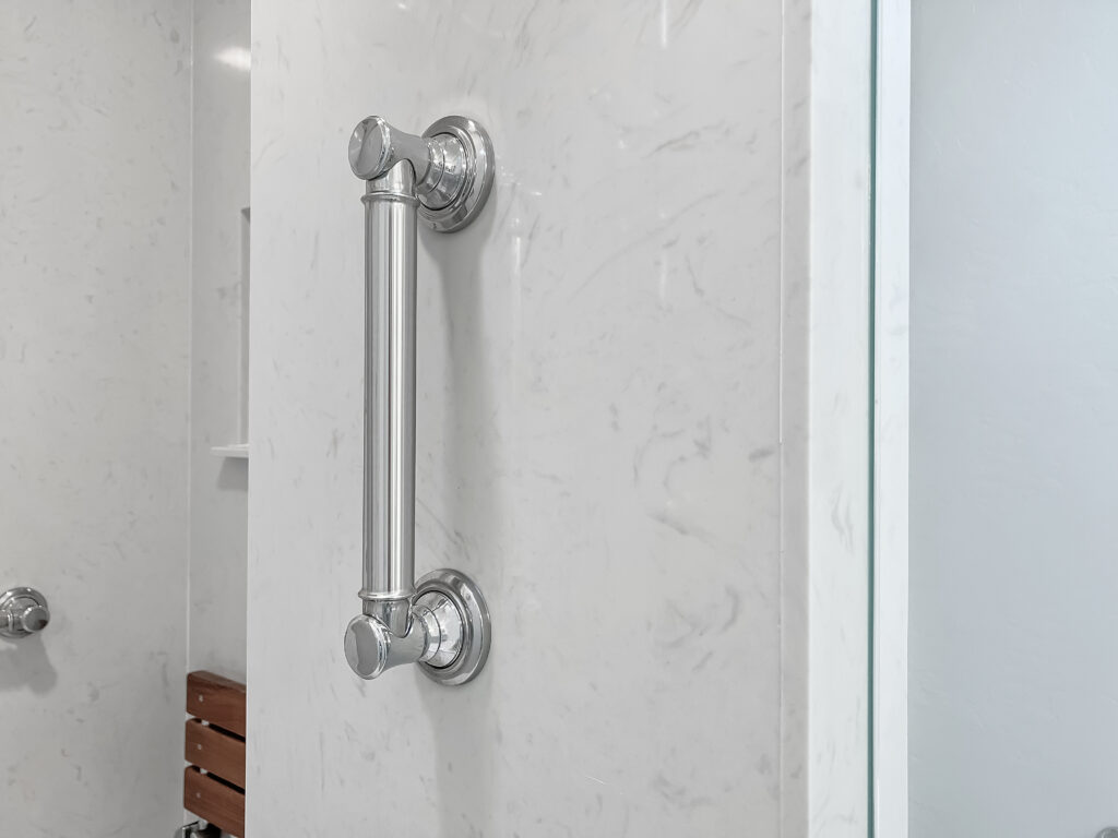 metal holding railing in shower area