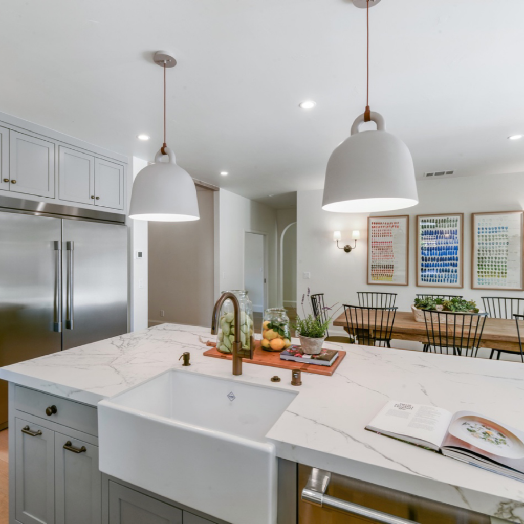Modern white kitchen with custom lighting