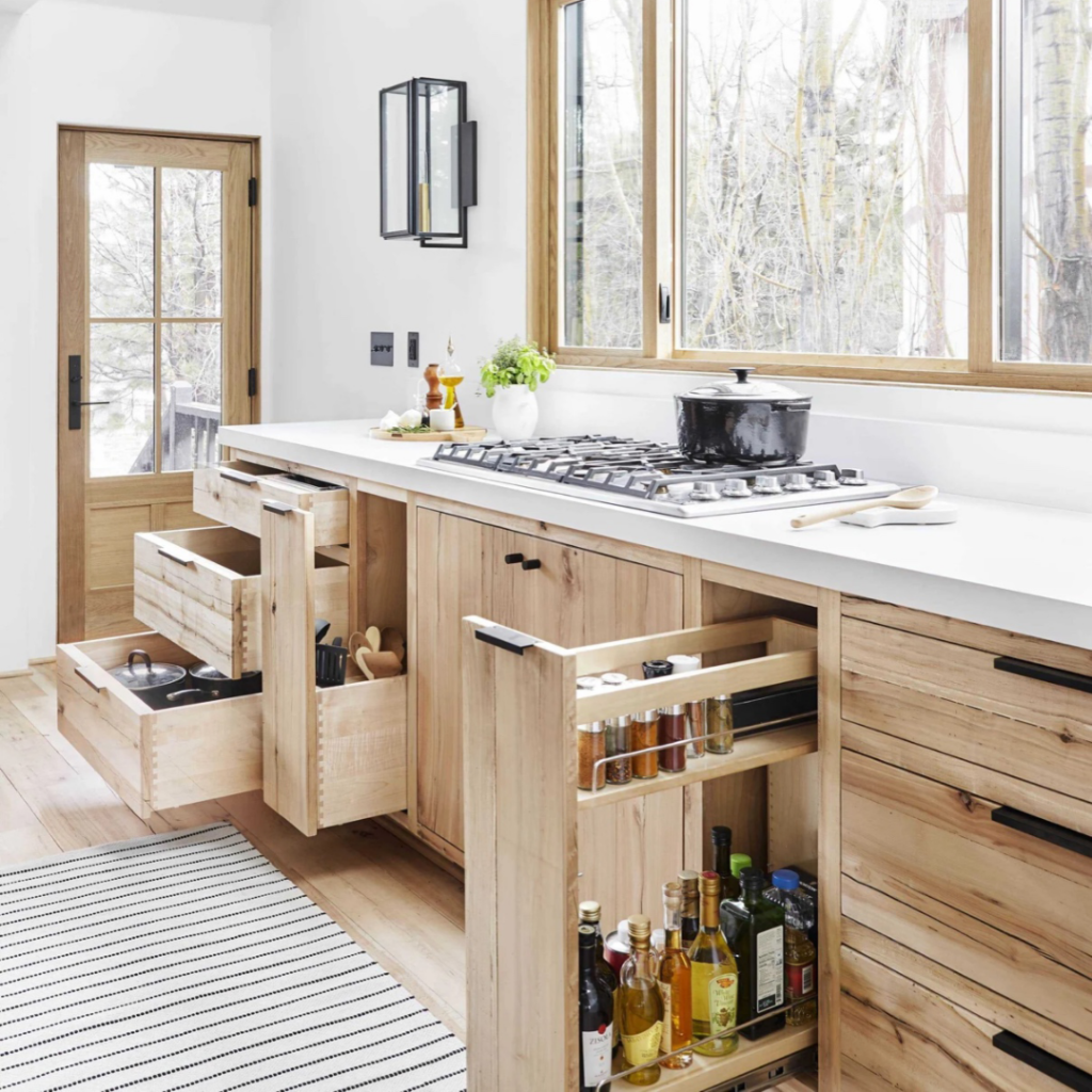 Modern home's kitchen with all of the drawers opened