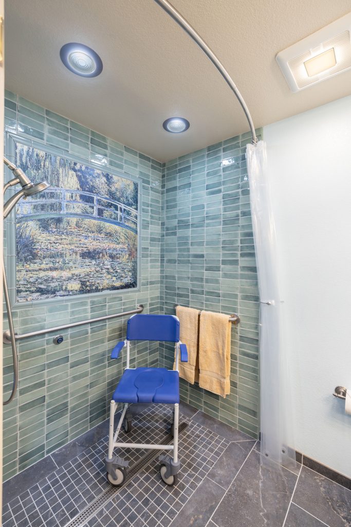 green and blue tile walk in shower