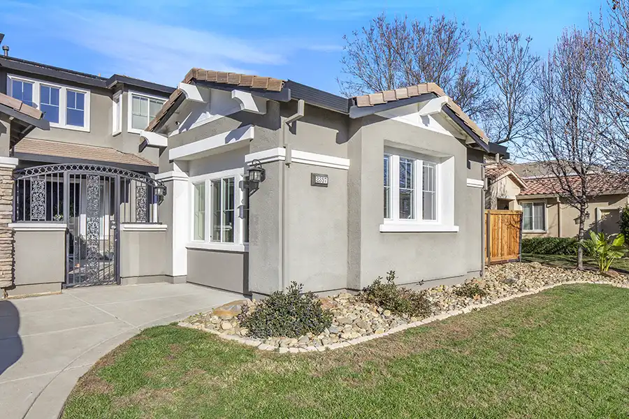 04 ARCH Exterior: Cream walls, light wood plank flooring, white window coverings, mini-split hvac, light colored window coverings