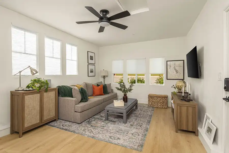 08 ARCH Cream walls, light wood plank flooring, white window coverings, mini-split hvac, light colored window coverings