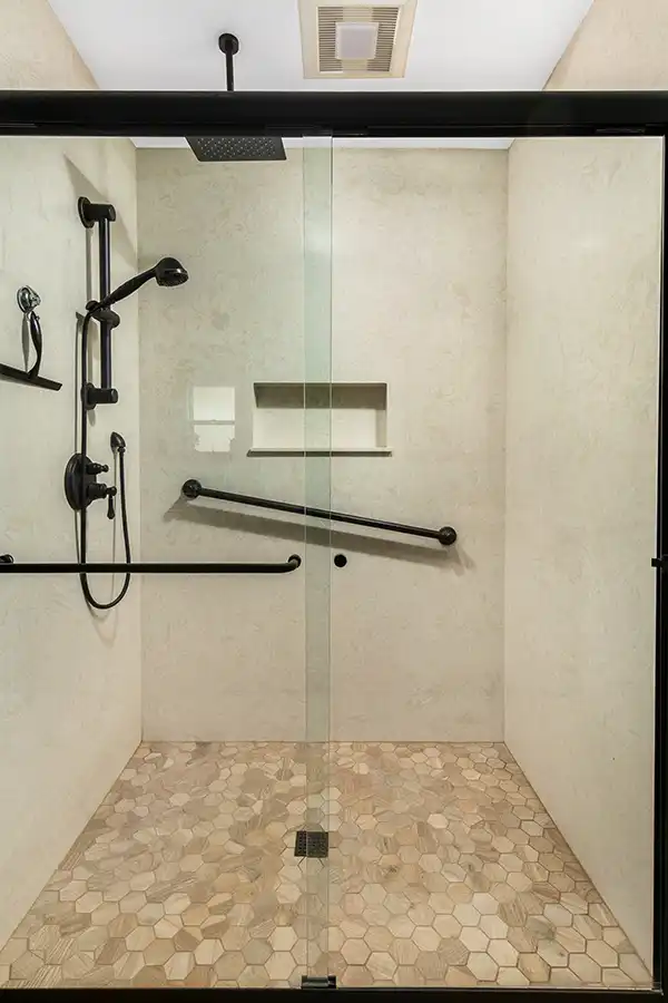 10 YellowoodPl_CareyBros12 Curbless or low-threshold shower with full-height tile, Pressure-balance or thermostatic shower controls, Floating or furniture-style vanity with stone countertop, Water-efficient fixtures compliant with California codes, Thoughtful lighting for both task and ambiance, Slip-resistant flooring selected for safety and durability